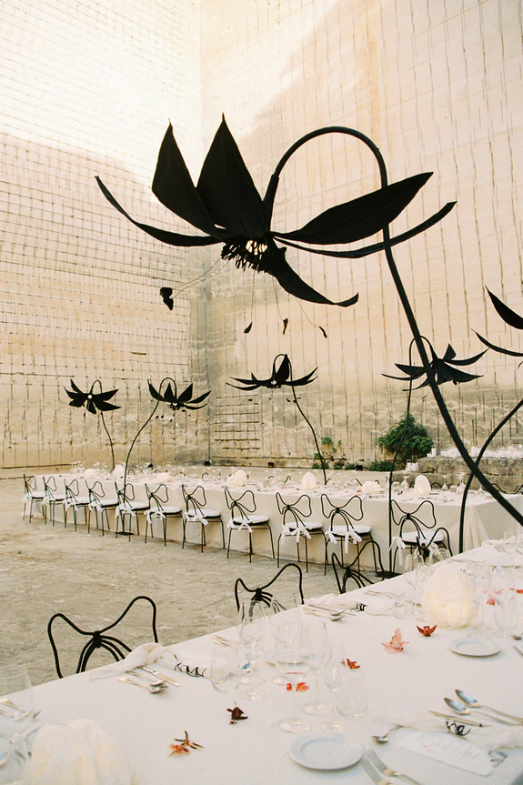 Giant Sculptural Florals & Dreamy Drapery by Mia Sylvia at This Stone Quarry Wedding in Menorca