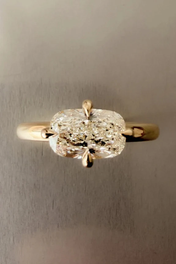 Can’t Stop Thinking About Madison Beer’s Engagement Ring? Here Are 30 Elongated Cushion-Cut Rings We Love