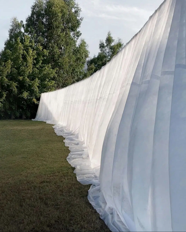 Draped Fabric Wedding Decor | Trendy Fabric and Tulle Wedding Decorations