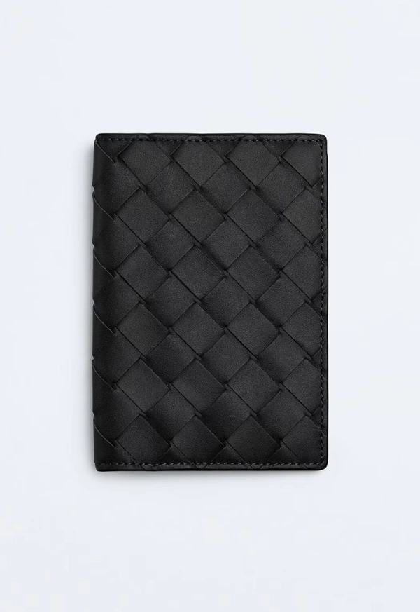 <a href="https://www.bottegaveneta.com/en-us/intrecciato--passport-case-black-812996833.html?gclsrc=aw.ds&gad_source=1&gad_campaignid=23655794154&gbraid=0AAAABDGxJN4pZ9DvQOL-8PQlovkaAKyn6&gclid=EAIaIQobChMIsqjg6tCslgMV011HAR01NS1oEAsYASABEgLTe_D_BwE">BOTTEGA VENETA Intrecciato Passport Case, $600</a>