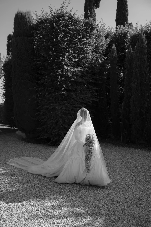 An Event Stylist’s Magical Italian Garden Wedding with a Vintage Red Ferrari & Forest Reception