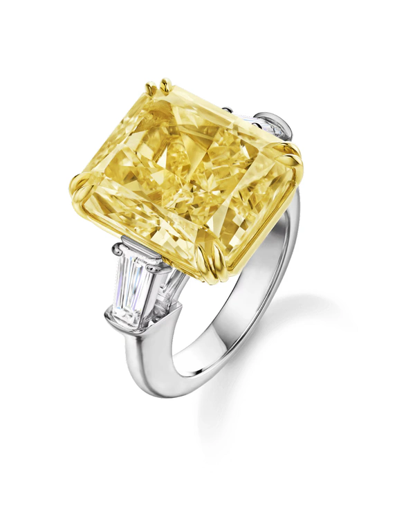 <a href="https://www.harrywinston.com/en/products/classic-winston/classic-winston-radiant-cut-yellow-diamond-ring-rgyedmra170tb">Harry Winston</a>