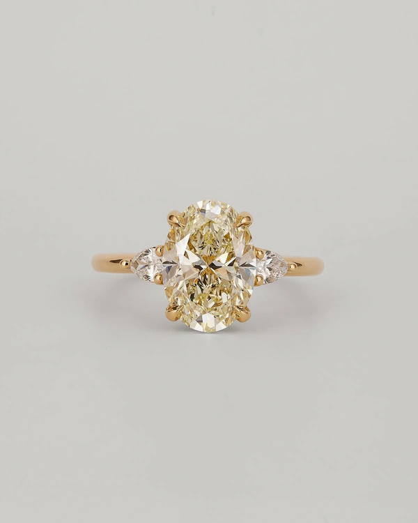 <a href="https://www.markbroumand.com/collections/yellow-diamond/products/4-01ct-cushion-cut-diamond-engagement-ring">Mark Broumand</a>