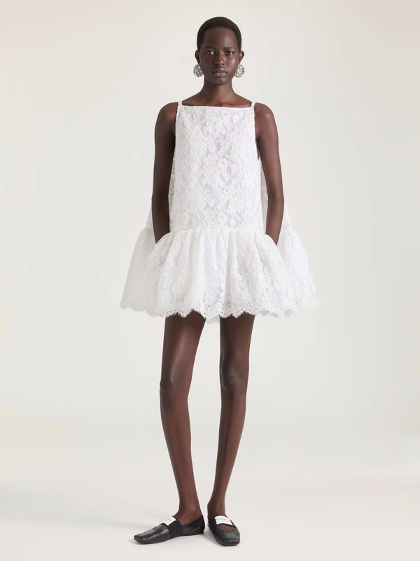 <a href="https://www.givenchy.com/us/en-US/sliced-mini-ruffled-dress-in-lace/BW22NC20HP-130.html">GIVENCHY Mini Dress</a>, $9,950