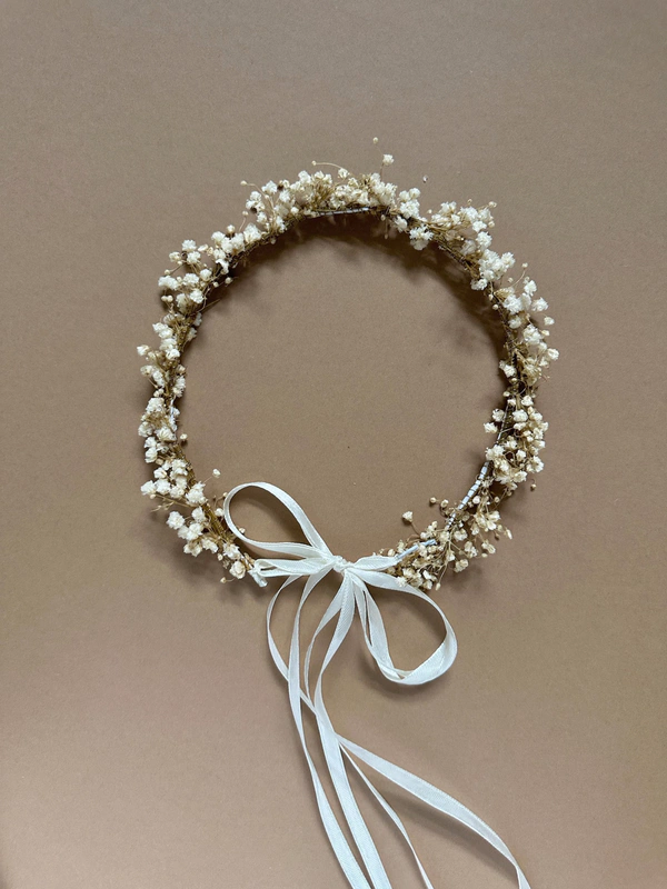 <a href="https://www.etsy.com/listing/1792103737/gypsophila-floral-crown-babys-breath?ls=a&amp;amp;ga_order=most_relevant&amp;amp;ga_search_type=all&amp;amp;ga_view_type=gallery&amp;amp;ga_search_query=white+flower+crown+ribbons&amp;amp;ref=sc_gallery-1-10&amp;amp;sr_prefetch=1&amp;amp;pf_from=search&amp;amp;pro=1&amp;amp;plkey=EujsvCJ66KRMr1afN1_P3ra09n0d%3ALT0caca558aeb1f9a098fbff49b21c11bd5a52db77">PAPADIE STUDIO Crown from Etsy</a>, $24