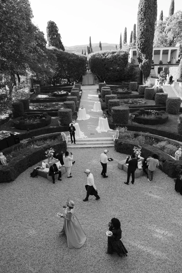 An Event Stylist’s Magical Italian Garden Wedding with a Vintage Red Ferrari & Forest Reception