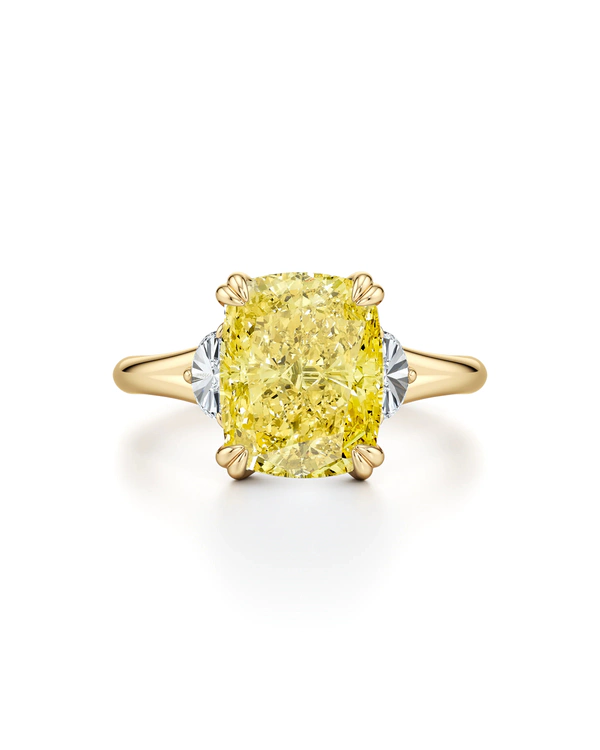 <a href="https://jeandousset.com/products/jane-3-05-ct-elongated-cushion-cut-yellow-diamond-three-stone-engagement-ring?variant=48655613493503&amp;">Jean Dousset</a>