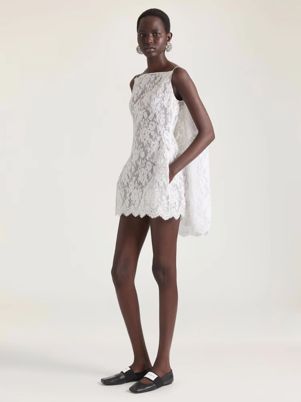 <a href="https://www.givenchy.com/us/en-US/sliced-mini-dress-in-lace-with-cape/BW22NB20HP-130.html">﻿GIVENCHY Mini Dress</a>, $8,950