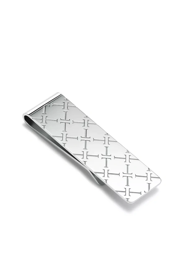 <a href="https://www.tiffany.com/home-accessories/personal-accessories/sterling-silver-personal-accessories-74616739.html">TIFFANY & CO. Tiffany T Money Clip in Sterling Silver, $525</a>