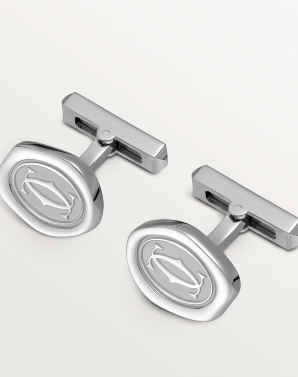 <a href="https://www.cartier.com/en-us/bags-and-accessories/accessories/cufflinks-%26-dress-accessories/wax-seal-motif-cufflinks-CROG000144.html">CARTIER Wax Seal Motif Cufflinks, $680</a>