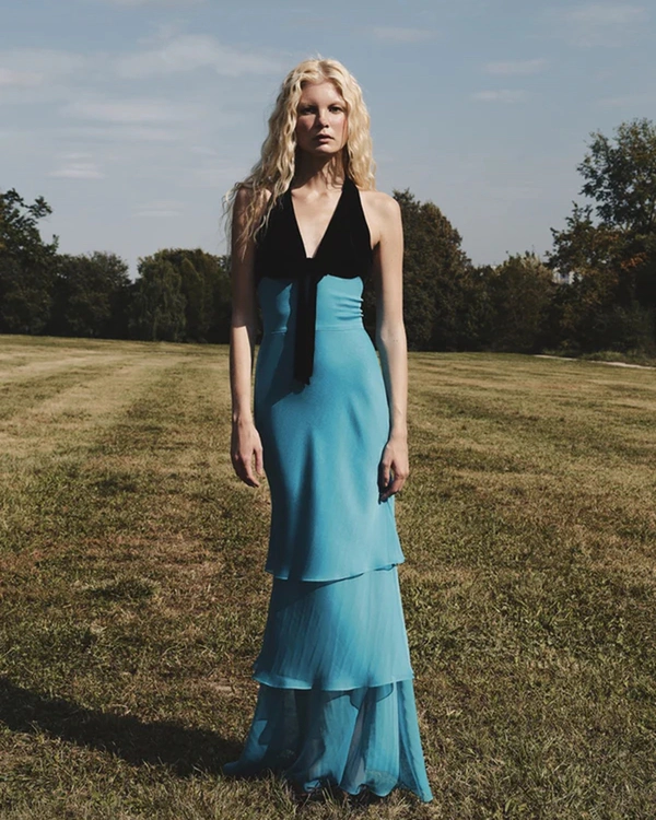 <a href="https://therasario.com/products/chiffon-and-velvet-maxi-dress-with-a-bow-turquoise-black?_pos=3&amp;_fid=fc18234da&amp;_ss=c">ROSARIO Chiffon and Velvet Maxi Dress</a>, $2,310
