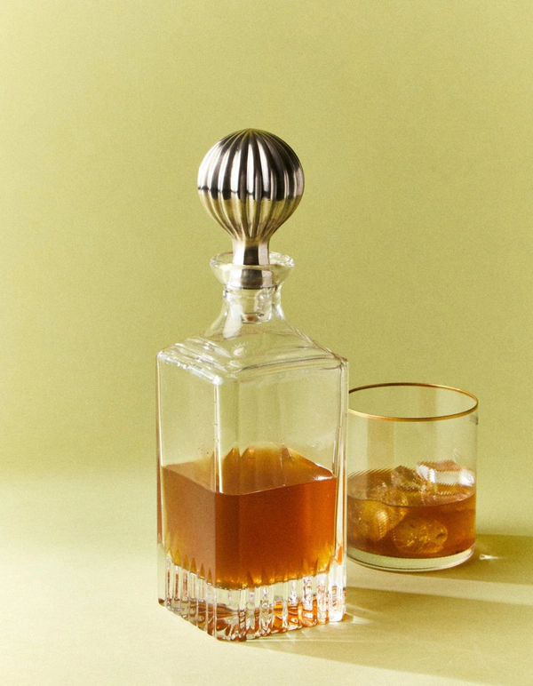 <a href="https://www.abask.com/en-us/products/vintage-alvaro-mid-century-silver-plated-and-crystal-decanter-clear-2201467005">ANTIQUE AND VINTAGE Mid-Century Silver-Plated and Crystal Decanter from ABASK, $965</a>