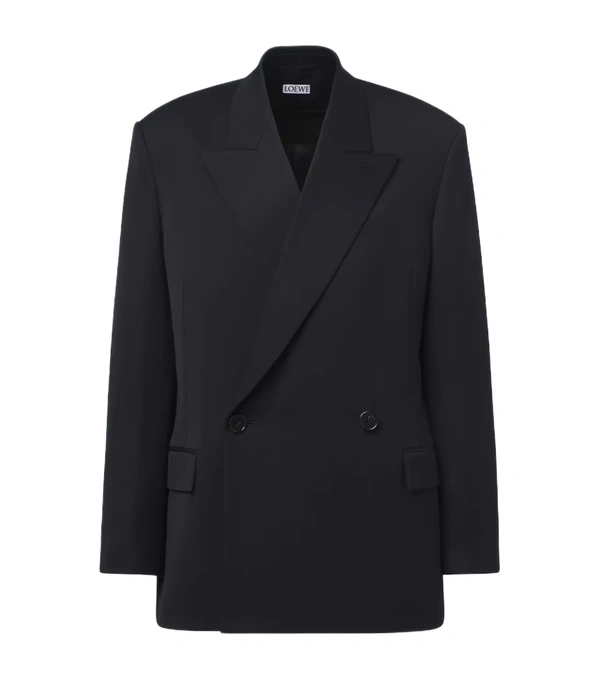 <a href="https://www.mytheresa.com/us/en/men/loewe-double-breasted-wool-blazer-blue-p01207444">LOEWE Blazer</a> from Mytheresa, $3600