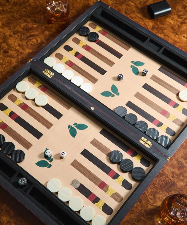 <a href="https://www.abask.com/en-us/products/elie-bleu-flor-de-alba-marquetry-sycamore-backgammon-set-2223807001">ELIE BLEU Flor de Alba Marquetry Sycamore Backgammon Set from ABASK, $7,960</a>
