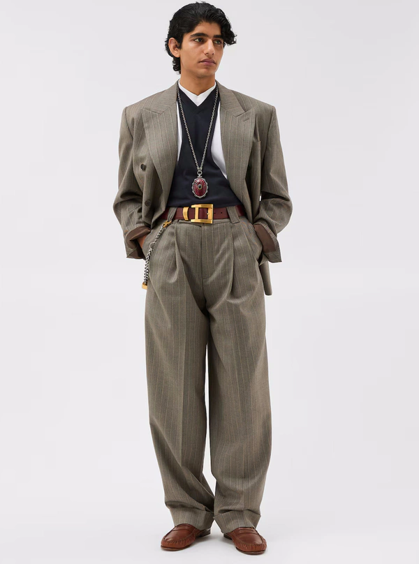 <a href="https://www.versace.com/us/en/men/clothing/blazers-suits/pinstripe-wool-boxy-blazer-gray/1023620-1A17854_2KX00.html">VERSACE Blazer</a>, $3790