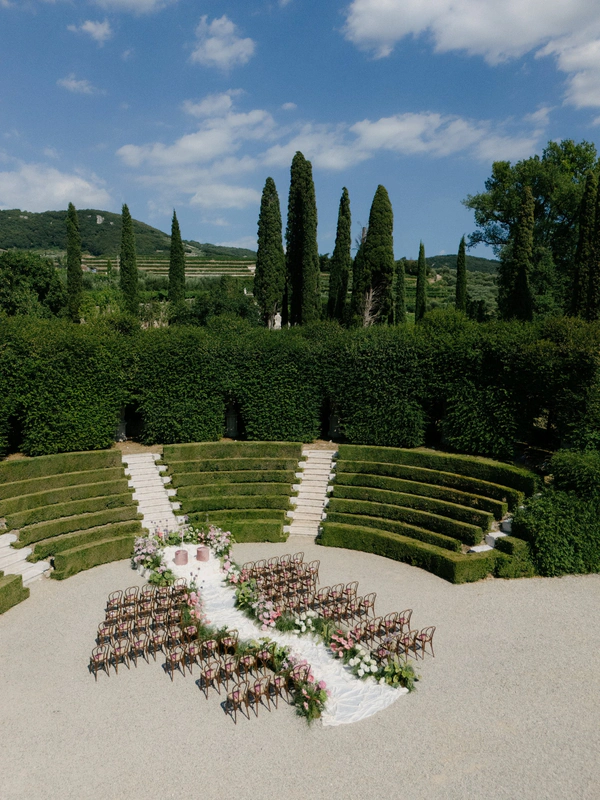 An Event Stylist’s Magical Italian Garden Wedding with a Vintage Red Ferrari & Forest Reception