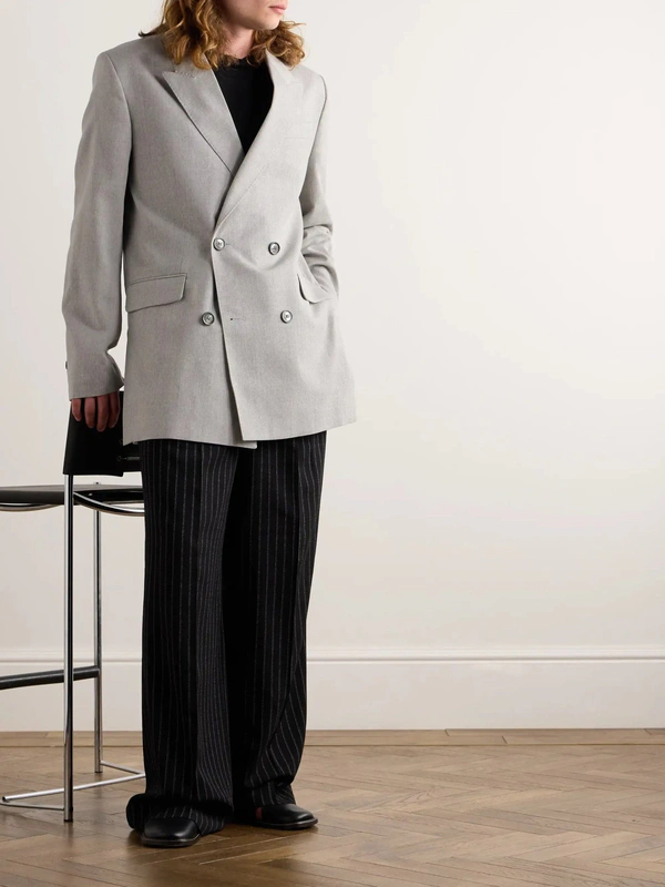 <a href="https://www.mrporter.com/en-us/mens/product/ami-paris/clothing/double-breasted-blazers/oversized-double-breasted-wool-blazer/1647597331643774">AMI PARIS Blazer</a> from Mr Porter, $386
