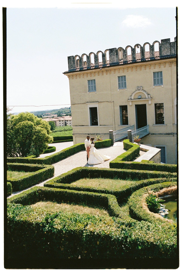 An Event Stylist’s Magical Italian Garden Wedding with a Vintage Red Ferrari & Forest Reception