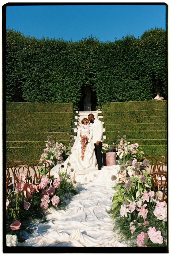 An Event Stylist’s Magical Italian Garden Wedding with a Vintage Red Ferrari & Forest Reception