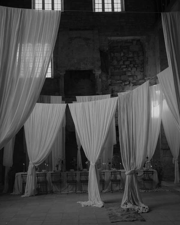 Classical European for Wedding Decor | Draped Fabrics, Candles, and Antique Silverware