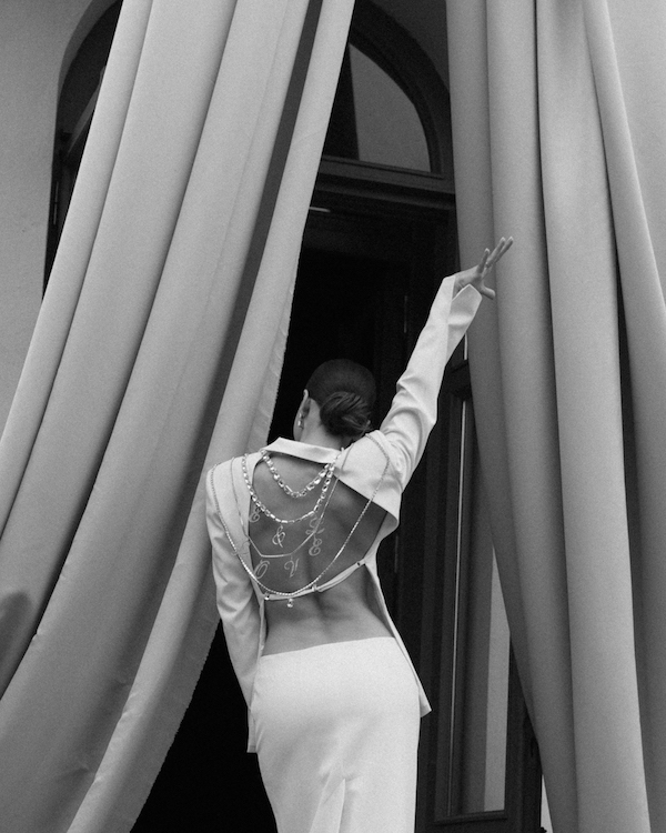 A Whimsical Wedding with a Giant Bow and Curved Tablescape