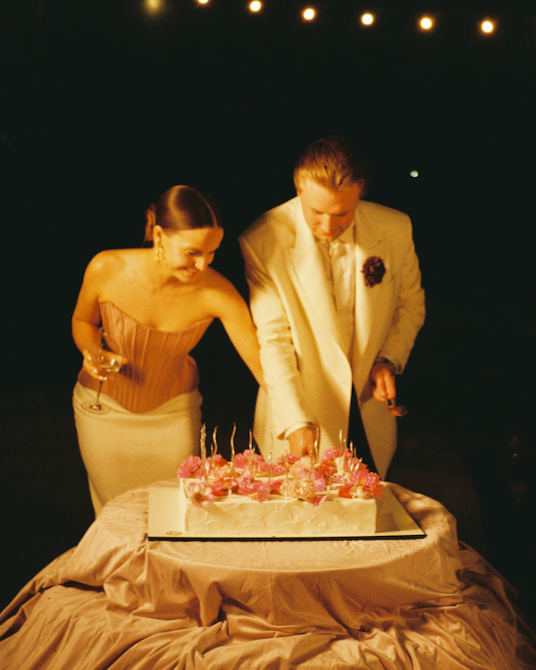 A Whimsical Wedding with a Giant Bow and Curved Tablescape