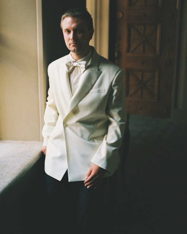 A Whimsical Wedding with a Giant Bow and Curved Tablescape