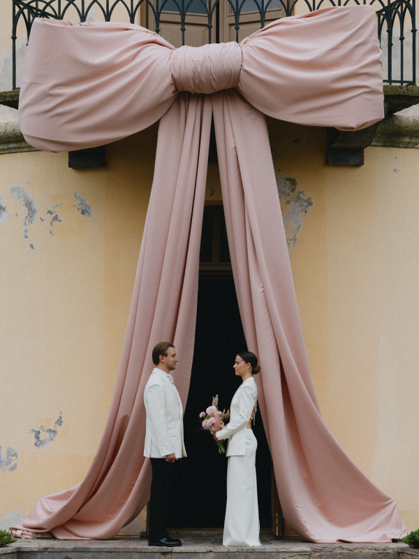 A Whimsical Wedding with a Giant Bow and Curved Tablescape