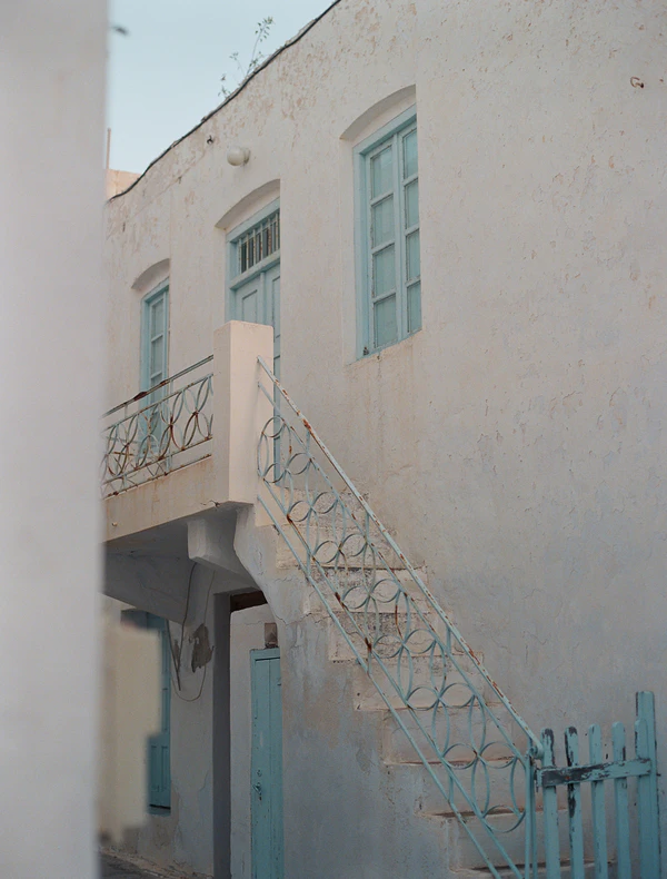 A Cinematic & Artistic Color-Washed Wedding Weekend at Amanzoe in Greece