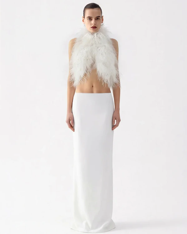 <a href="https://ilkyazozel.com/products/jazzy-top-in-white-mustang">Ilkyaz Ozel</a>