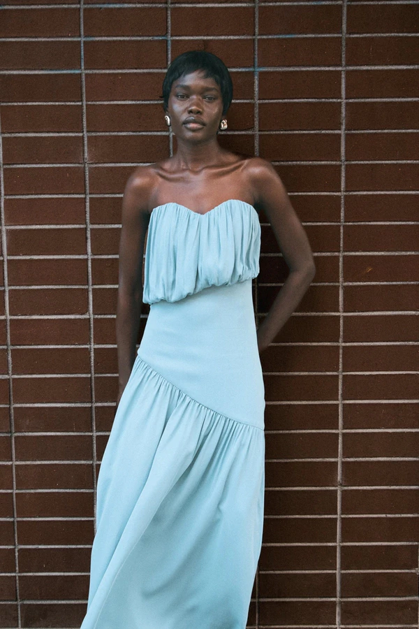 <span><a href="https://thirdform.com/collections/dresses/products/seraphic-strapless-maxi-dress-aquatic" target="_blank" rel="noopener noreferrer">THIRD FORM Strapless Maxi Dress</a>, $224</span>