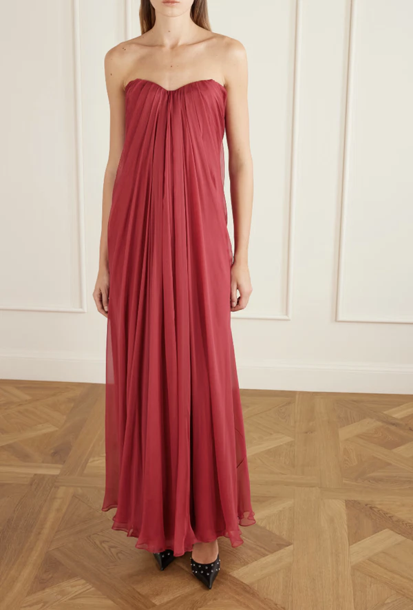 <a href="https://www.net-a-porter.com/en-us/shop/product/mcqueen/clothing/gowns/strapless-draped-silk-chiffon-bustier-gown/46376663163053746">MCQUEEN Strapless Gown from Net-a-Porter, $4,500</a>