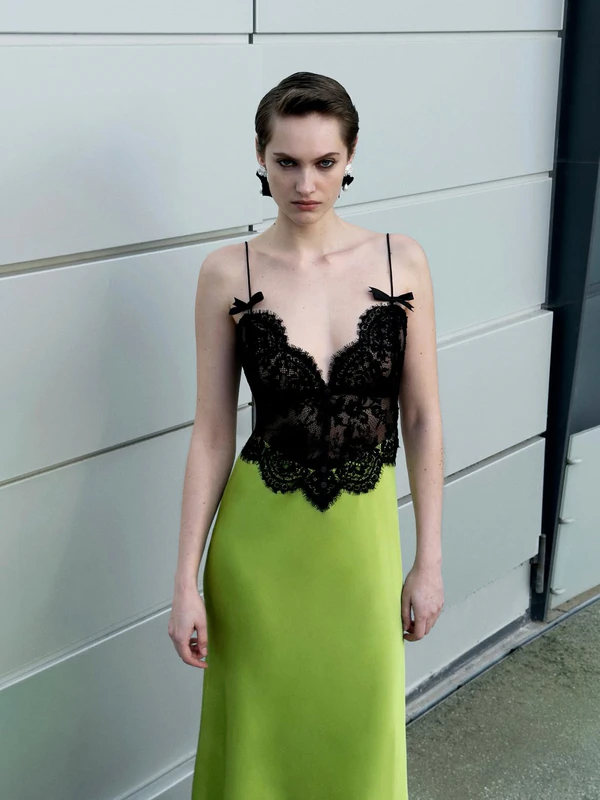 <a href="https://us.self-portrait.com/products/aw26-green-satin-lace-midi-dress?country=us">SELF-PORTRAIT Green Satin Lace Midi Dress, $690</a>