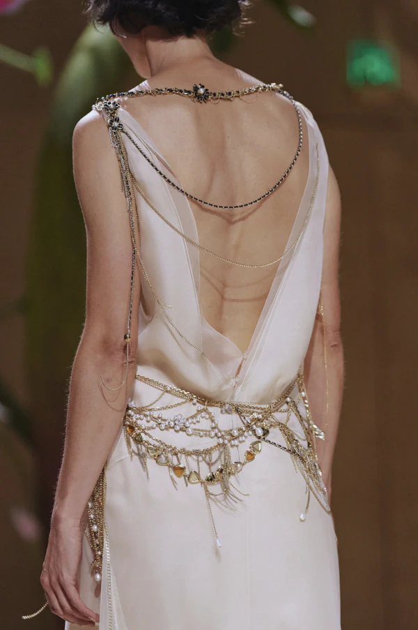 <a href="https://www.chanel.com/gb/haute-couture/26khc/look-54/">Chanel</a>