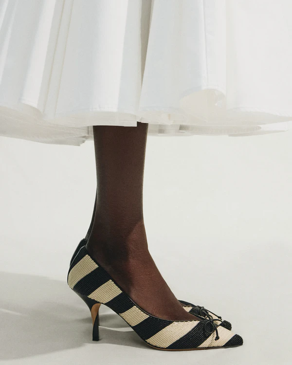 <a href="https://www.jacquemus.com/en_us/the-tourni-heels/FOW00178AE000811FY.html">JACQUEMUS The Tourni Heels</a>, $1,090