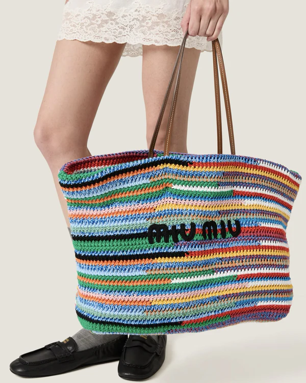 <a href="https://www.miumiu.com/us/en/p/crochet-tote-bag/5BG228_AF46_F0055_V_ORO">MIU MIU Crochet Tote Bag</a>, $2,600
