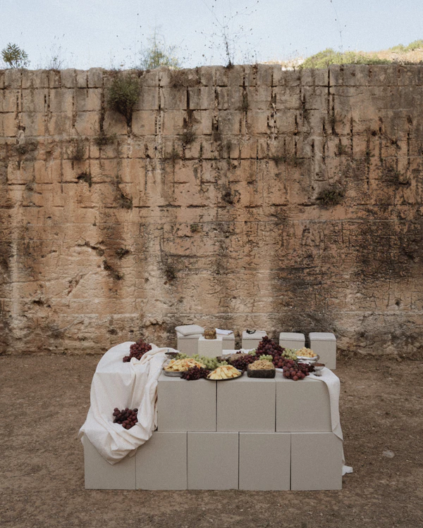 An Intimate Menorca Quarry Wedding with Avant-Garde Design & Vintage Bridal Looks