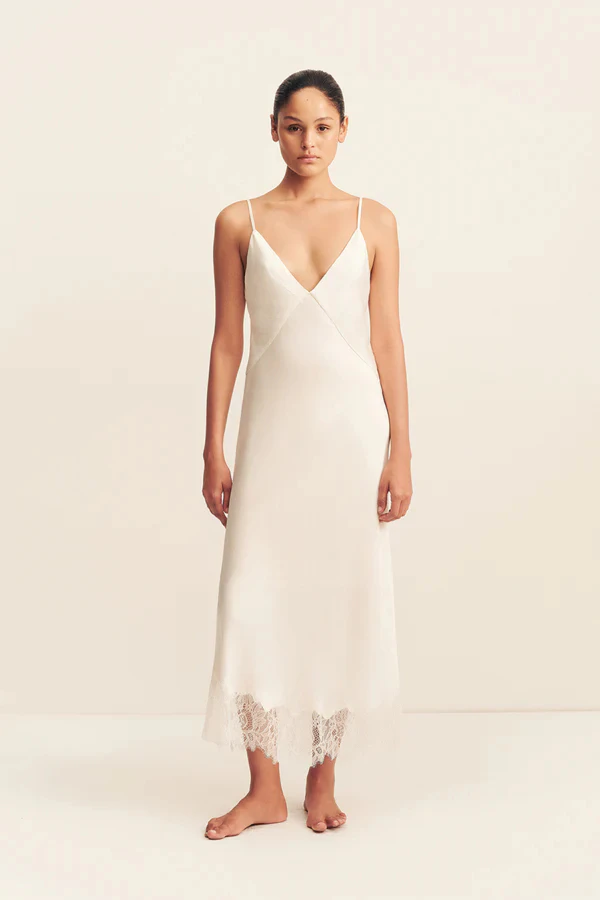 <a href="https://shonajoy.com/products/lustre-lace-slip-midi-dress-ivory">SHONA JOY Lustre Lace Mid Skirt</a>, $220