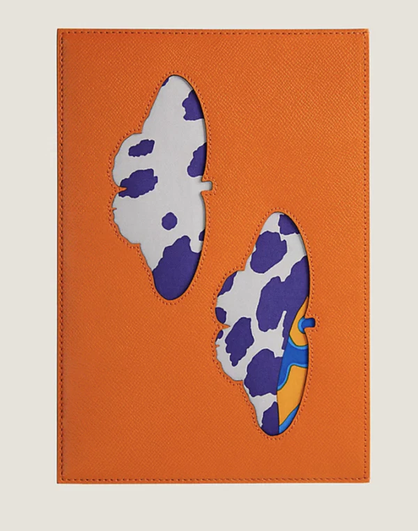 <a href="https://www.hermes.com/us/en/product/passport-holder-H1019378v92/">HERMÈS Passport Holder, $1,300</a>