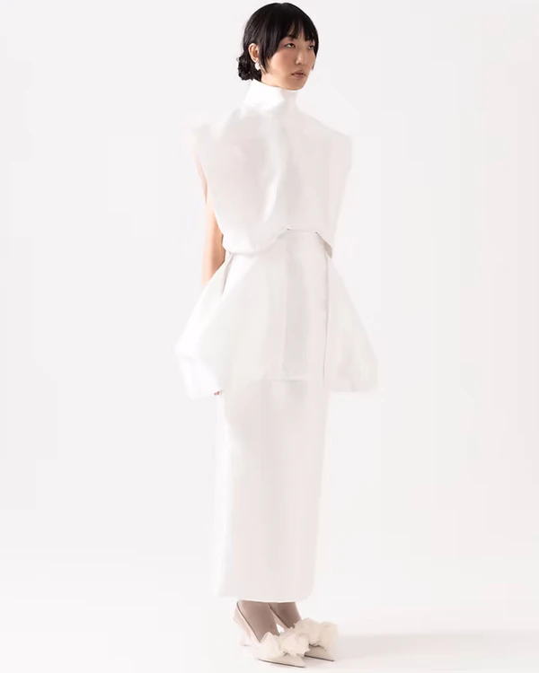 <a href="https://www.mayarajunges.com/product-page/blusa-cimon">MAYARA JUNGES Blouse</a>, $389, <a href="https://www.mayarajunges.com/product-page/saia-lio-bridal">MAYARA JUNGES Skirt</a>, $529
