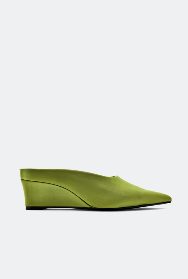 <a href="https://www.simonmillerusa.com/products/satin-pointed-gala-wedge-in-moss?variant=52793904726380&amp;country=US&amp;currency=USD&amp;utm_medium=product_sync&amp;utm_source=google&amp;utm_content=sag_organic&amp;utm_campaign=sag_organic&amp;gad_source=1&amp;gad_campaignid=17518140131&amp;gbraid=0AAAAACqiQWY9ZYkeDa2kGgNJlPZqSY64c&amp;gclid=CjwKCAjw_KjVBhAHEiwAnC0N9Ap3qqcDKll22JF-CmvYBhGpG9avJNapr6XUIbz5h6ggh9fwz2GmwhoCe0AQAvD_BwE">SIMON MILLER Satin Wedge Mules, $355</a>