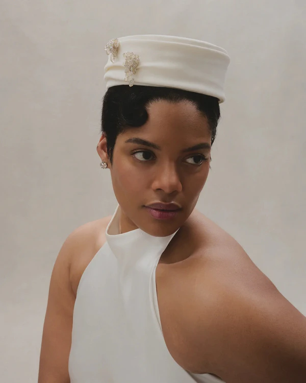 <a href="https://alexandragrecco.com/products/edie-hat?Title=Default+Title">Alexandra Grecco</a>