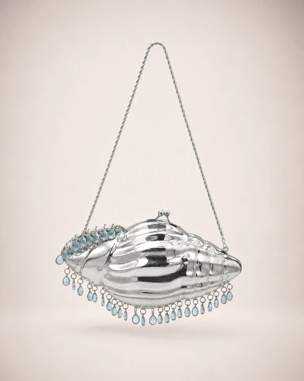 <a href="https://thevin.store/products/silver-conch-aquamarine?variant=49052349595892">VIN Bag</a>, $650
