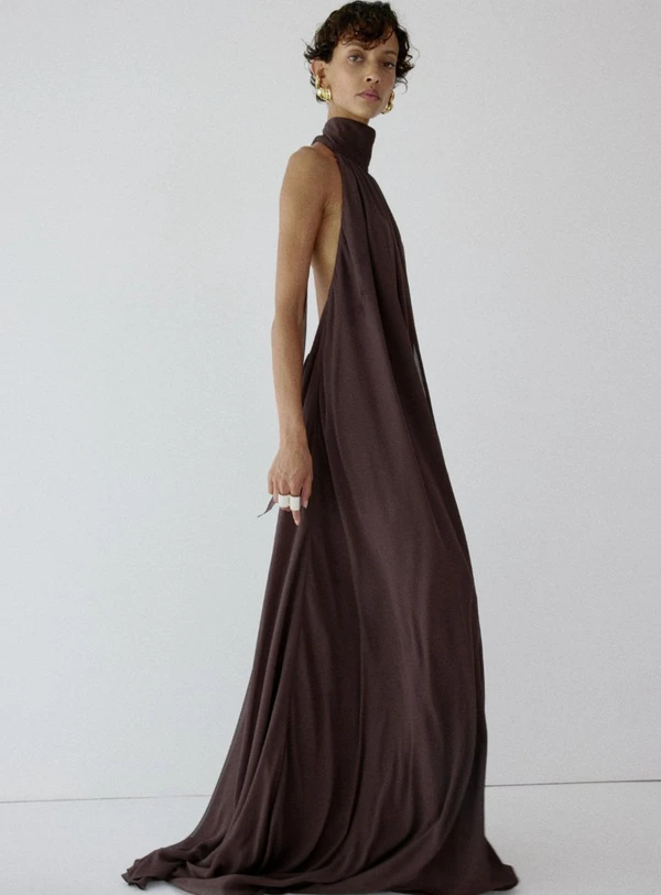 <a href="https://www.delavali.com/products/adela-maxi-dress-in-umber-brown-chiffon">DE LA VALI Adela Maxi Dress in Umber Brown Chiffon, $706</a>