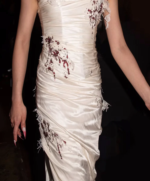 <a href="https://www.dreamingeli.com/product-page/not-her-last-dance-dress">DREAMING ELI Dress﻿</a>, $2825