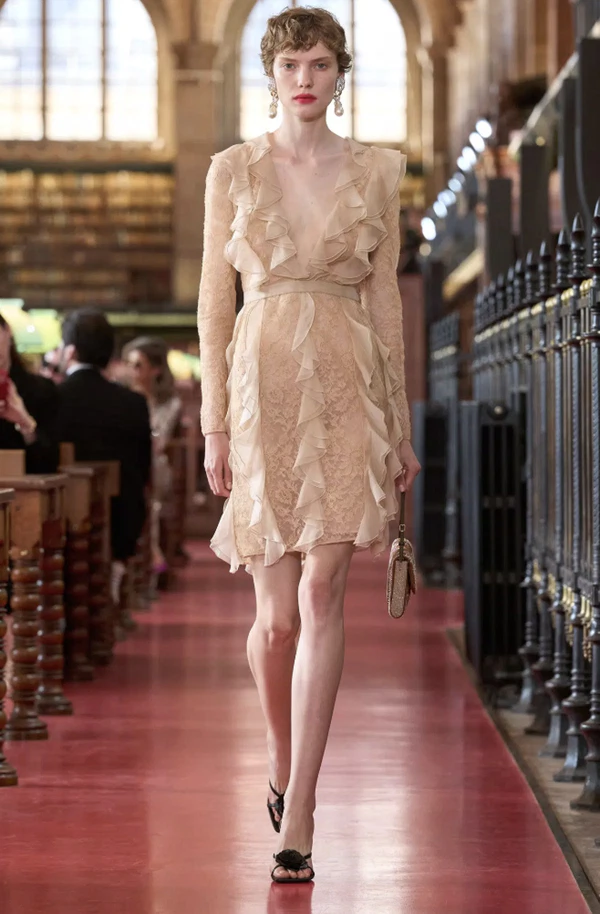 <a href="https://www.valentino.com/en-us/v-universe/fashion-shows/pret-a-porter/valentino-antibiblioteca-spring-summer-2027/explore-the-looks">Valentino</a>