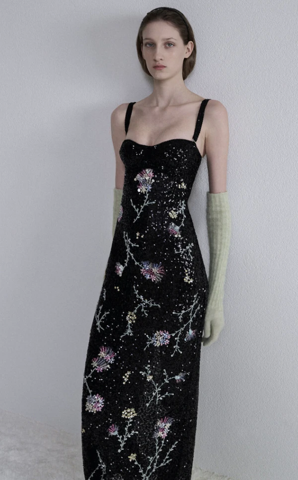 <a href="https://www.modaoperandi.com/women/p/des_phemmes/embellished-maxi-dress/736019">DES PHEMMES Embellished Maxi Dress from Moda Operandi, $1,565</a>