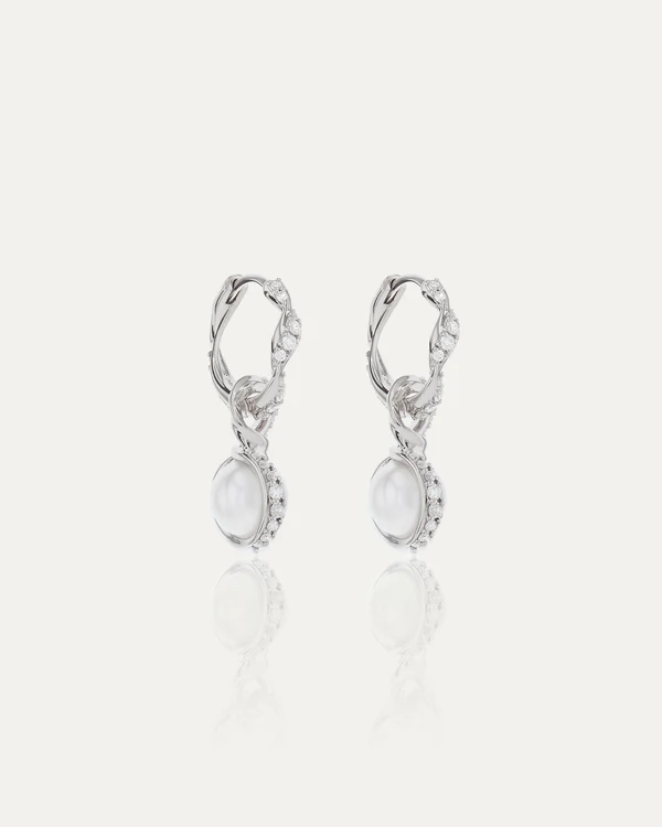 <a href="https://www.sarahandsebastian.com/en-us/products/overtone-diamond-hoops-white-gold">SARAH & SEBASTIAN Overtone Diamond Hoops</a>, $3,800