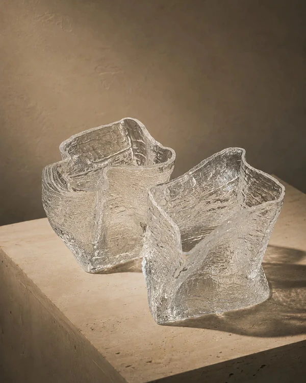 <a href="https://oblist.com/products/sculptural-textured-glass-cups-set-of-2">HOMA Sculptural Textured Glass Cups</a> from The Oblist, $584