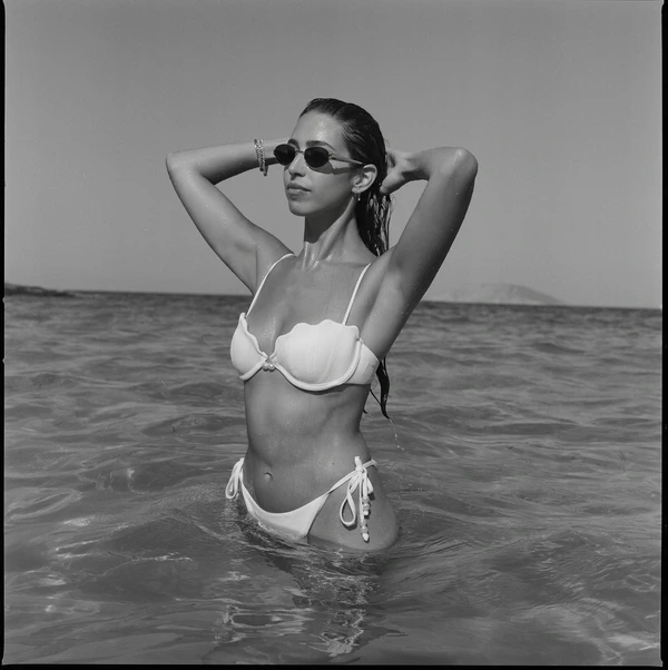 A Cinematic & Artistic Color-Washed Wedding Weekend at Amanzoe in Greece